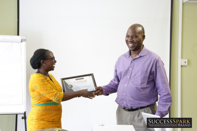 Michael receiving his certificate